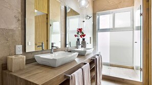 Shower, hair dryer, towels, shampoo