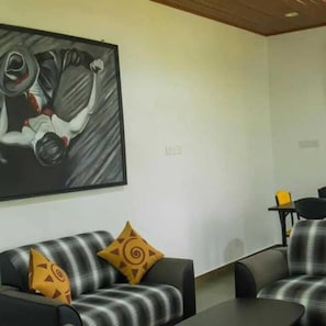 Dobbelt- eller tomannsrom – familie, hageutsikt | Oppholdsområde