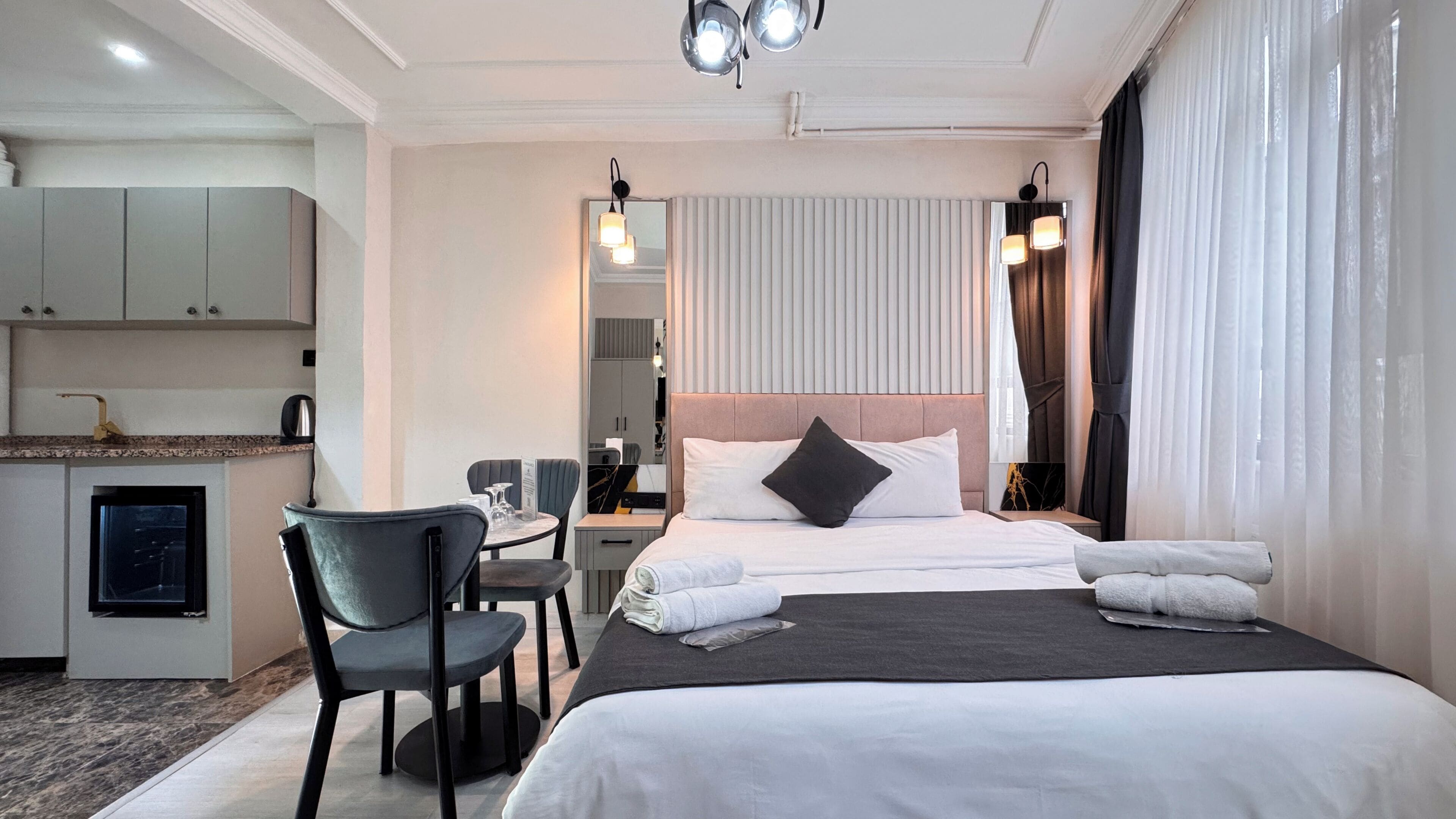 Egyptian cotton sheets, premium bedding, down comforters, minibar