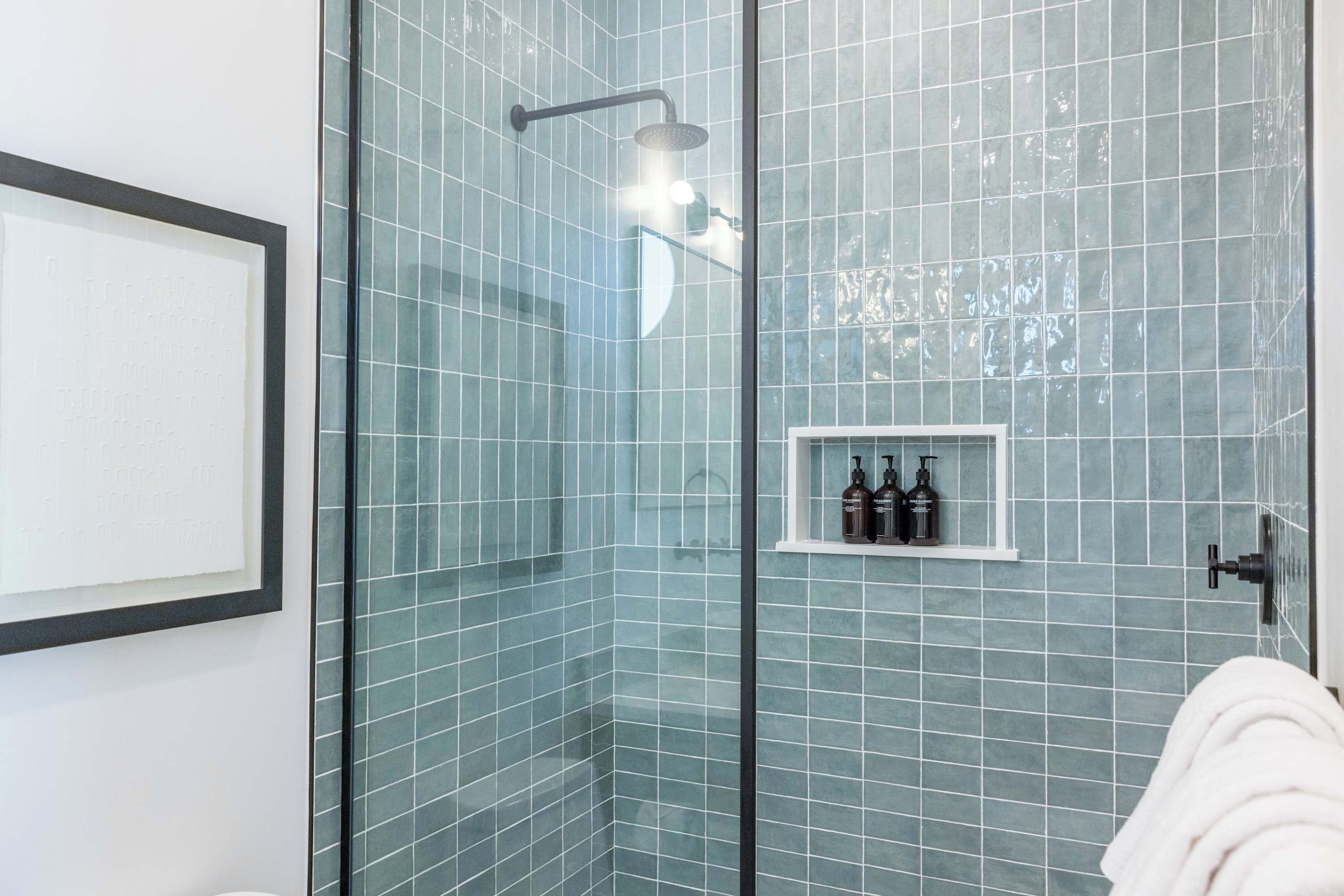 Shower, hair dryer, towels, shampoo