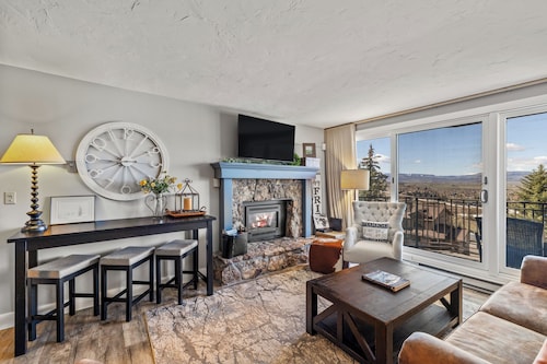 Sweeping views from this ski in/walk out, cozy Bronze Tree condo!