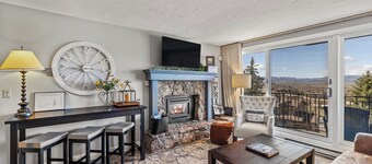 Sweeping views from this ski in/walk out, cozy Bronze Tree condo!