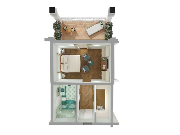 Een hotelplattegrond met twee verdiepingen, balkon, slaapkamer, badkamer en een zithoek.