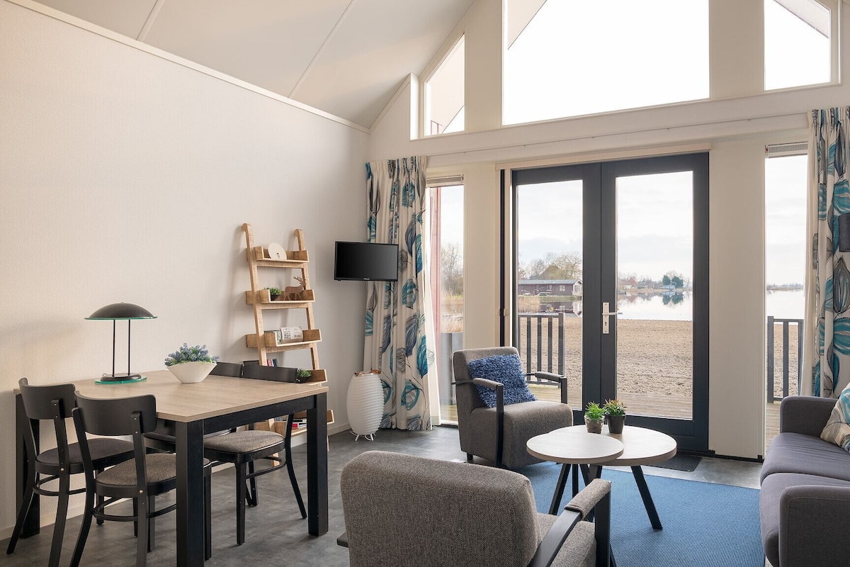 Ferienhütte (Strandlodge Duin) | Wohnzimmer | Fernseher