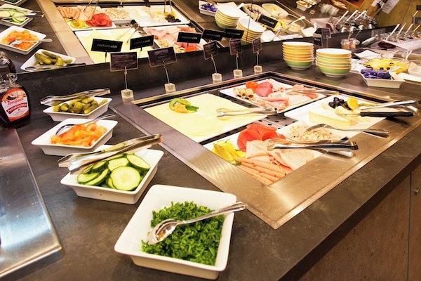 Daily buffet breakfast (EUR 14 per person)