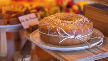 A cake on a wooden table with a label.