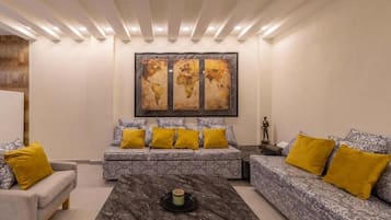 Apartment, 3 Bedrooms | Living area