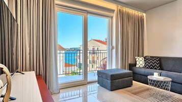 Apartment (Two-Bedroom Apartment With Balcony An) | Living room | 32-inch flat-screen TV with satellite channels