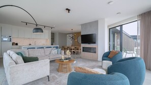 Appartement (Pharos Penthouse Sky) | Salle de séjour | Télévision