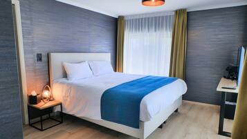 Superior Double Room | Desk, laptop workspace, blackout drapes, iron/ironing board (on request)