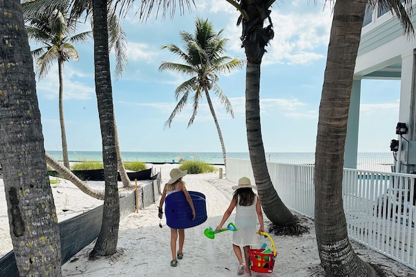Private beach access. Scroll up to view video, right after picture of house.