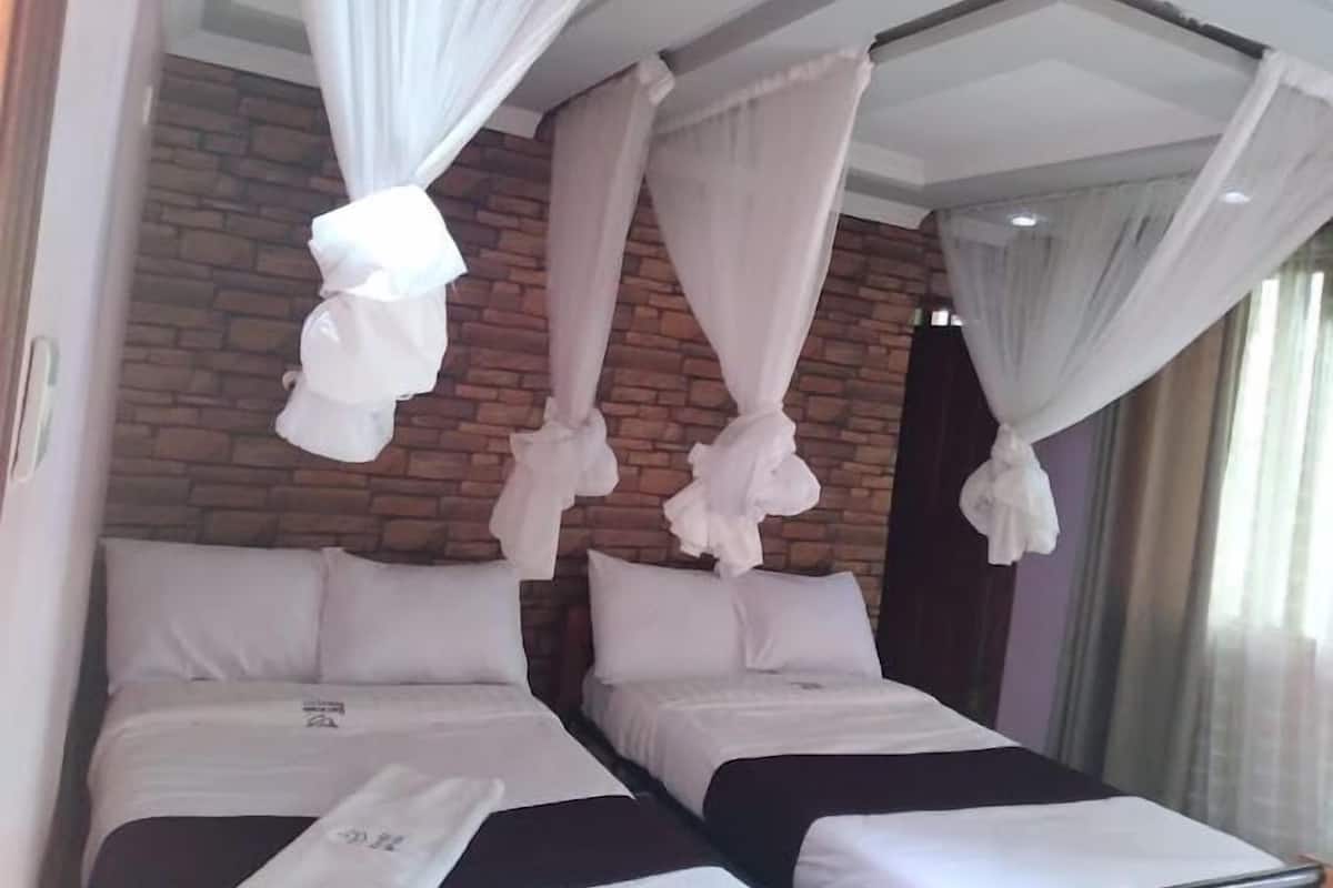 Chambre Double Deluxe, vue piscine | Wi-Fi gratuit, draps fournis