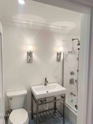 Hair dryer, towels, soap, toilet paper