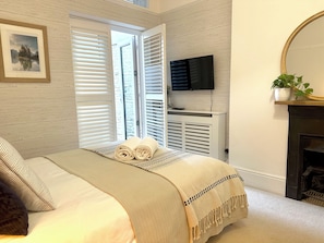 1 chambre, fer et planche Ă repasser, Wi-Fi gratuit, draps fournis