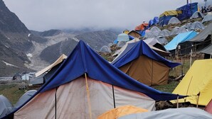 A series of tents set up in a mountainous area, likely for camping or outdoor activities. - YATRA DHAM CAMP KEDARNATH  (Kedarnath)