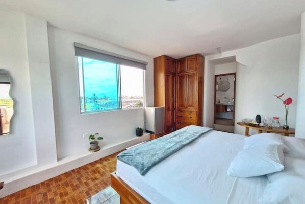 1 habitación, tabla de planchar con plancha, wifi gratis y ropa de cama 