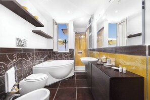 Shower, jetted bath, hair dryer, bidet