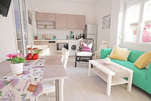 Apartment, 2 Bedrooms, 2 Bathrooms, Beachside | Private kitchen | Microwave, coffee/tea maker, electric kettle, highchair