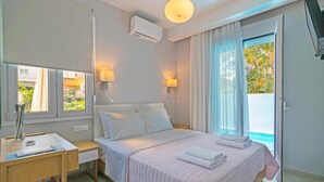 Apartemen, 2 kamar tidur, akses ke kolam renang, pemandangan laut | 7 kamar tidur, kedap suara, dan setrika/meja setrika