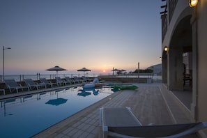 Outdoor pool, pool umbrellas, pool loungers
