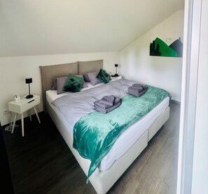 2 slaapkamers, een kluis op de kamer, een strijkplank/strijkijzer