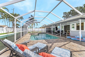 Soak up the Florida sunshine and unwind by your private heated pool at Coral Breeze!