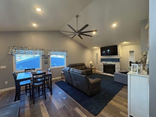 Smart TV, fireplace, foosball, books