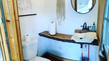 Shower, towels, soap, toilet paper