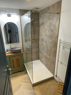 Shower, hair dryer, towels, soap