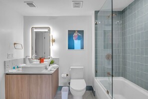 Hair dryer, towels, soap, shampoo