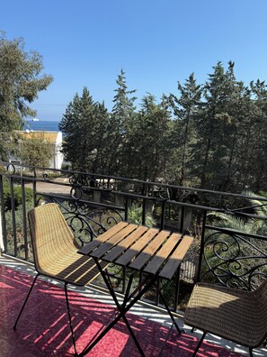 Deluxe Quadruple Room, Balcony, Sea View | Terrace/patio