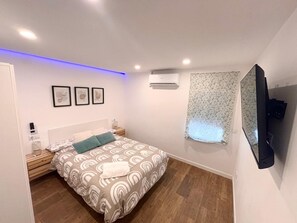 2 dormitorios, tabla de planchar con plancha, wifi y ropa de cama