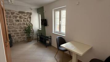 Appartement, 1 chambre | Coin séjour