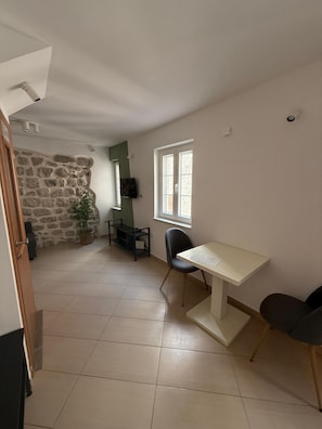 Apartamento, 1 habitación | Zona de estar