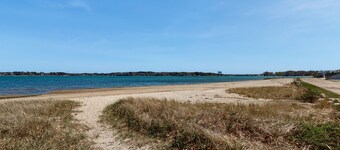 Charming coastal home with sunny rooms, private backyard, & walk to beach