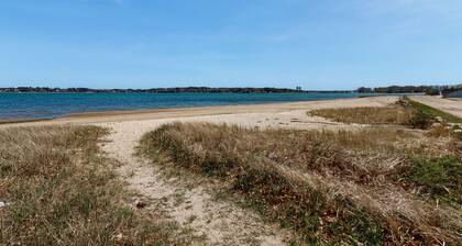 Charming coastal home with sunny rooms, private backyard, & walk to beach