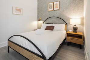 1 bedroom, desk, iron/ironing board, bed sheets