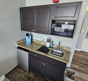 Fridge, microwave, coffee/tea maker, toaster