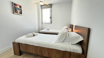 2 dormitorios, tabla de planchar con plancha, wifi y ropa de cama
