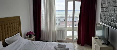 1 dormitori, planxa i posts de planxar, wifi i roba de llit