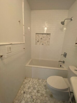 Hair dryer, towels, soap, toilet paper