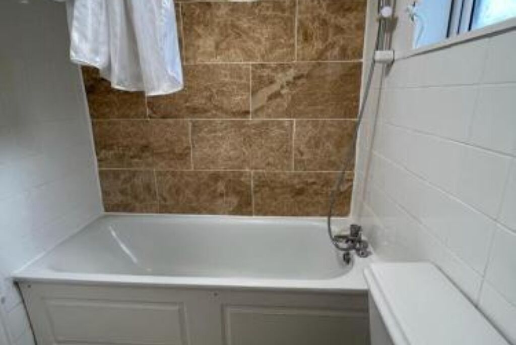 Shower, towels, soap, toilet paper