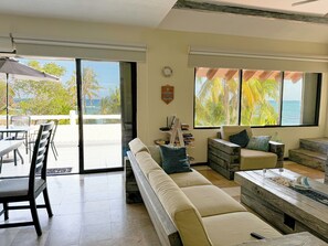 Living area - Azure Caribbean Beach Front Apartment (Puerto Aventuras)