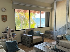 Living area - Azure Caribbean Beach Front Apartment (Puerto Aventuras)