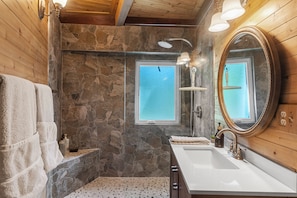 Shower, towels, soap, toilet paper