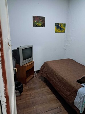 Habitación individual clásica, vistas a la ciudad | Wifi gratis y ropa de cama