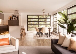 TV, table football - Award Winning Stunning Modern Glass Wall Penthouse, Leicester City Centre Treeside Views (Leicestershire)