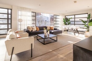 TV, table football - Award Winning Stunning Modern Glass Wall Penthouse, Leicester City Centre Treeside Views (Leicestershire)