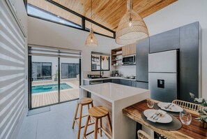 Fridge, microwave, stovetop, dishwasher - Modern Pool Villa Walk to Beach (Santa Cruz)