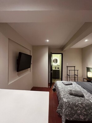 1 habitación, tabla de planchar con plancha, wifi y ropa de cama 